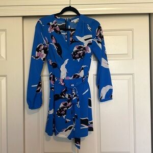 Cute romper! Long sleeve with v-neck and belting at the waist. Size 2.